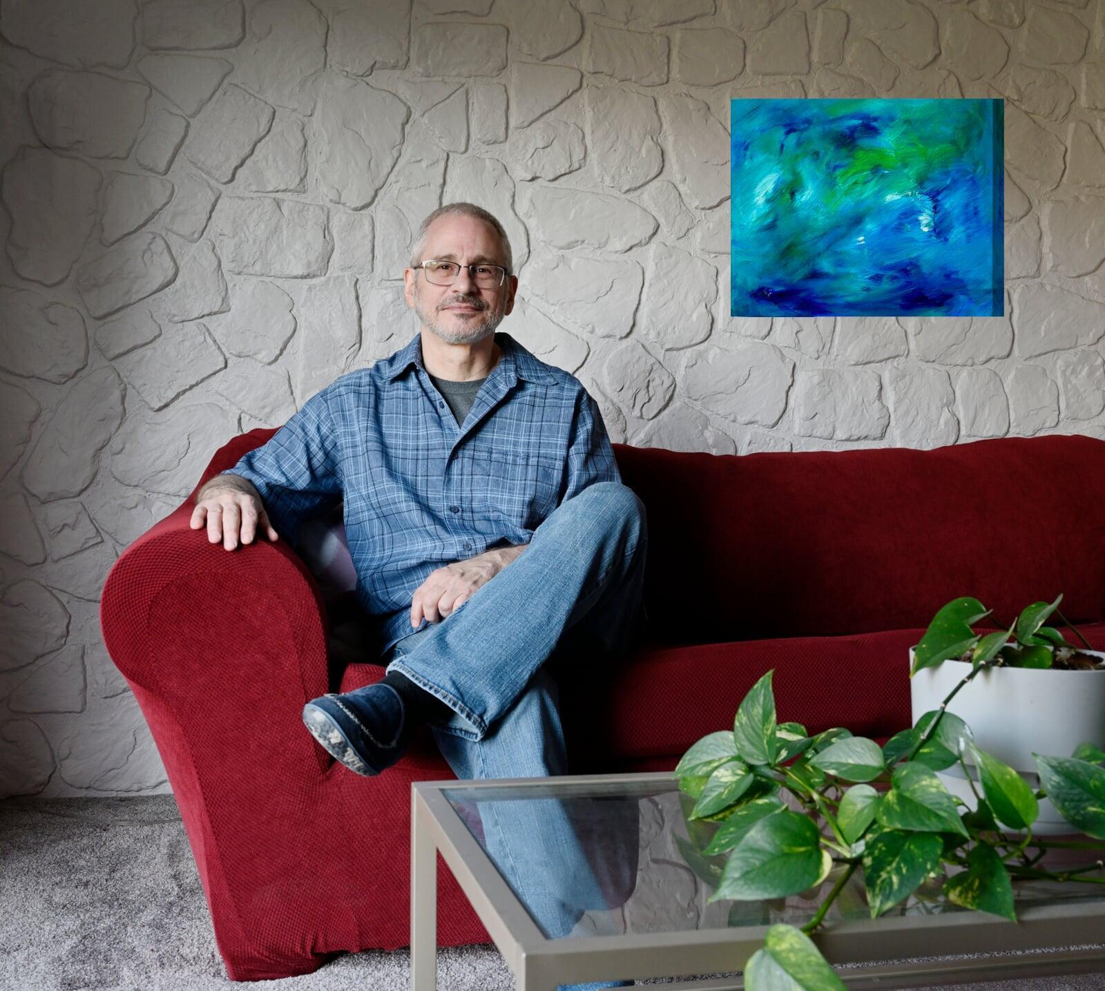 Picture of Joe Loffredo with Aquamarine Seas painting